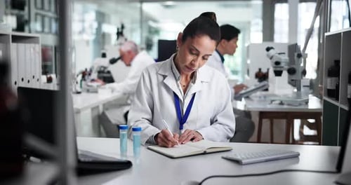 Female Scientist Working in a Modern Laboratory