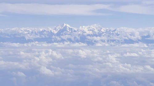 Clouds in Sky Taken from Airplane – Aerial View of Atmosphere and Blue Horizon