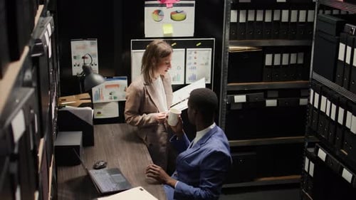 Investigators Study Evidence in Office