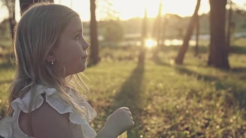 Beautiful Little Blonde Girl Has Happy Fun Cheerful Smiling Face White Dress Soap Bubble Blower