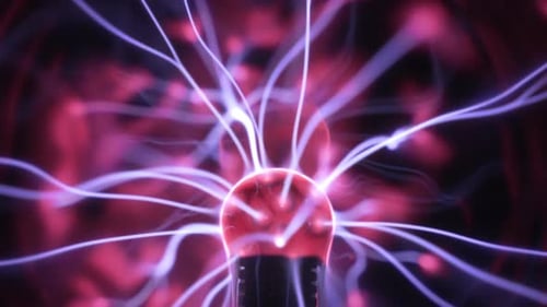 Plasma globe in slow motion. Blue and purple light beams, energy rays and pulsating light spheres sl