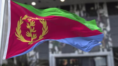 Drapeau ondulé de l'Érythrée dans le vent agitant le drapeau officiel 4K