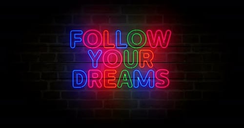 Follow Your Dreams neon on brick wall loop