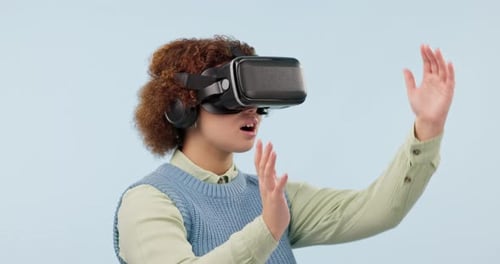 Young Adult Interacting With Virtual Reality Goggles