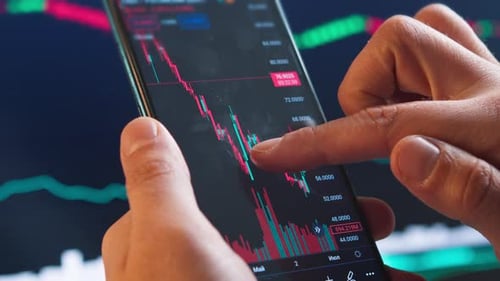 Smartphone Screen With Stock Market Charts And Crypto Trading Data