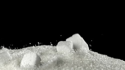 Sugar Cubes Fall Into a Pile of Sugar Filmed on a Highspeed Camera at 1000 Fps