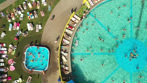 Top View of an Outdoor Place for People to Relax Where There is a Swimming Pool and a Lot of Sun