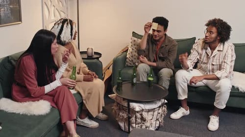 Friends Playing Guessing Game At Home