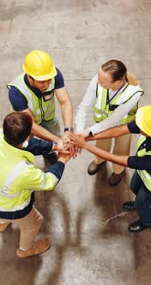 Hands together, success and shipping with people in warehouse for logistics team