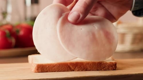 Sandwich Preparation Close Up on Cutting Board