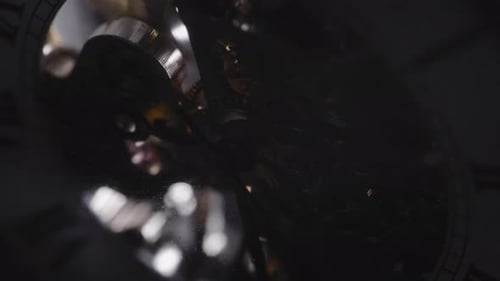 Light Passes Through An Old Watch Mechanism Working. - Macro Shot