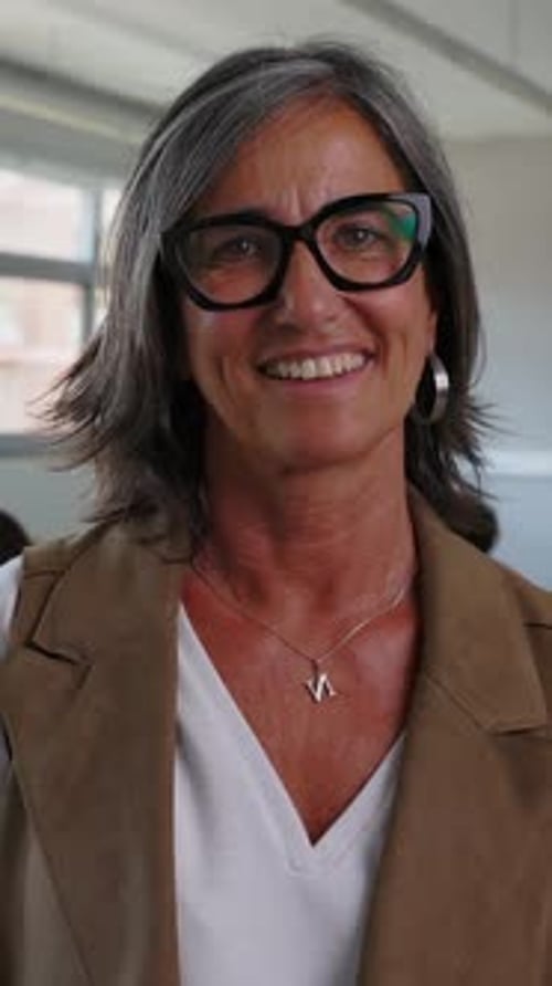 Close up Portrait of Smiling Woman With Glasses