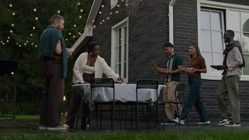 Friends Gathering at an Outdoor Home Meal