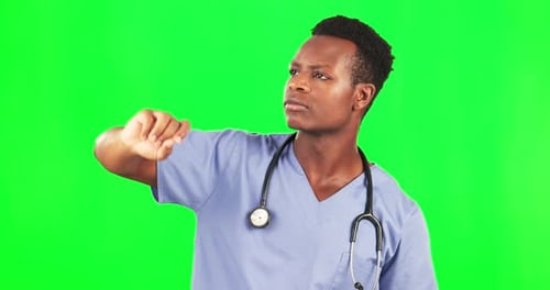 Green screen, black man and invisible touch isolated on studio background for healthcare