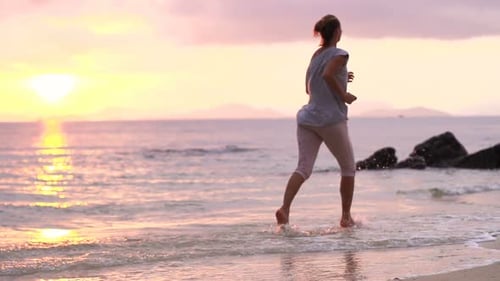 Woman Jogging During Beautiful Sunset on Beach, Super, 240