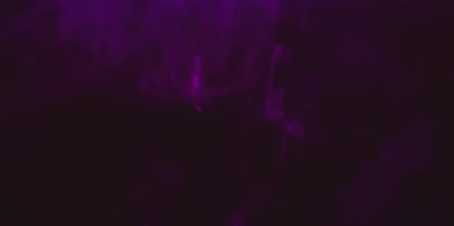 Purple smoke on black background