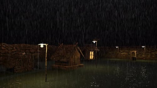 The rain falls on cottages in the countryside at night