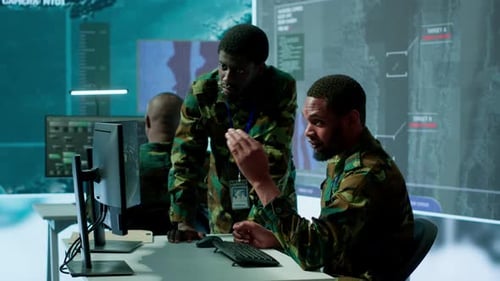 Government Analysts Work in an Advanced Command Center with Satellite Radar