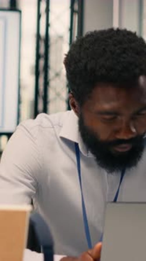 Vertical Video Black Professional Reviewing Resource Allocation and Performance Metrics