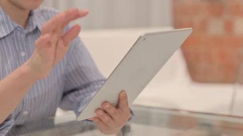 Close up of Businesswoman Hand Using Tablet