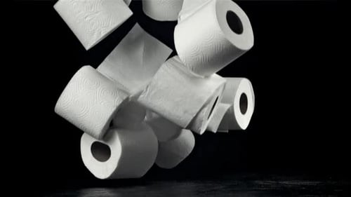 Toilet Paper Falls on the Table On a Black Background Filmed on a Highspeed Camera at 1000 Fps