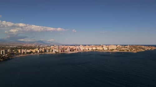 Aerial Wide View of Alicante City Skyline Along the Mediterranean Coast with Mountains in the