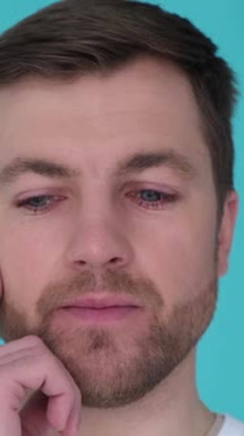 Portrait of a Man Focused and Absorbed in His Thoughts Vertical Video