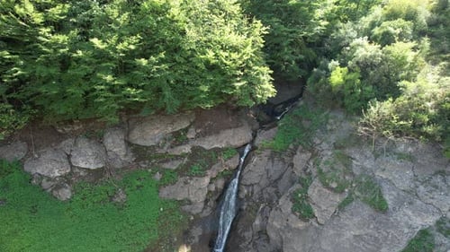 Aerial View of Remote Forest Waterfall