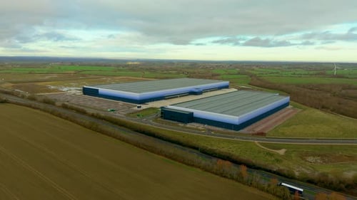 Regional Warehouse Complexes Operating Logistics Infrastructure Within Open Industrial Landscape