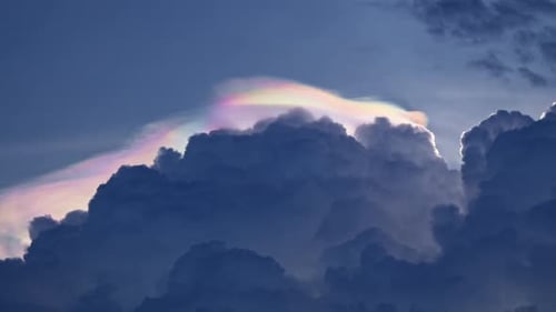 Dramatic Rainbow Light on Storm Cloud