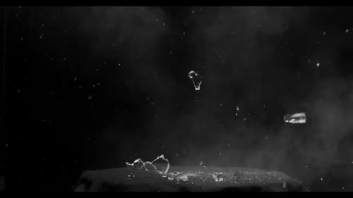 Dramatic Glass Shatter Explosion Reveal with Smoke