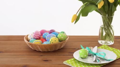 Festive Easter Table Setting with Colorful Eggs