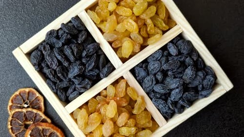 Sweet, dry, golden or yellow raisin made from grapes are a healthy, nutritious food. Golden raisins