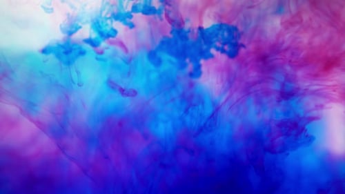 Abstract Blue and Pink Ink Swirling on Light Background