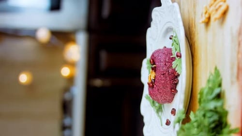 Beet Paste Garnished with Parsley and Pomegranate Seeds