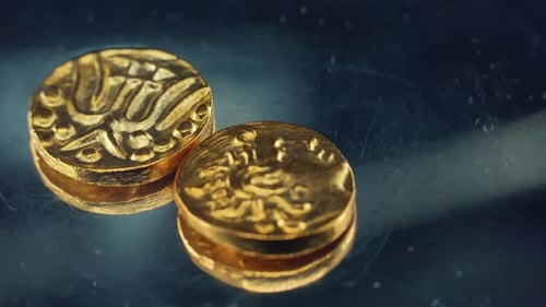 detailed video of ancient golden coins, antique Arab money, vintage Egyptian treasure, on a 360 rota