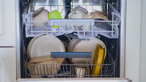 Dishwasher Full of Dirty Dishes in a Home