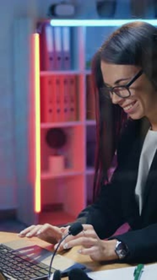 Pretty Positive Highskilled Purposeful Dark Haired Young Female Office Manager in Black Business