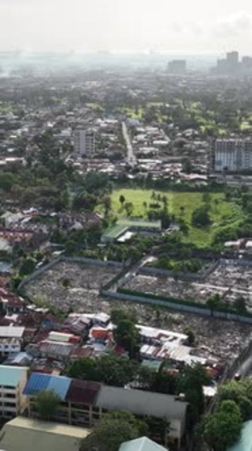 Aerial shot of Cebu City in the Philippines. Vertical Video.