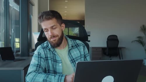 Fatigue at Work in Office Headache From Overstrain Focused Employee Cleaning Glasses While Seated at