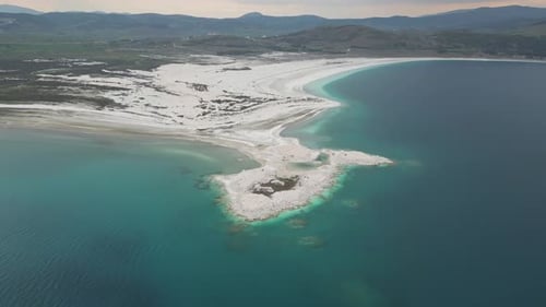 Turquoise Lake Shore and Peninsula in Aerial View From Turkey