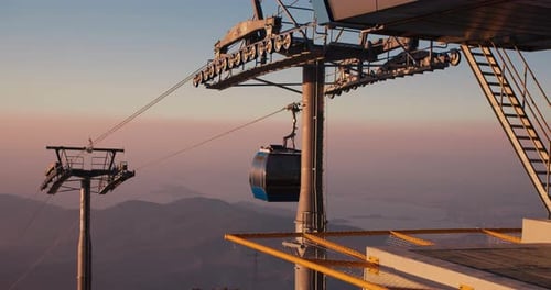 Cable Cars Moving Down in Mountain