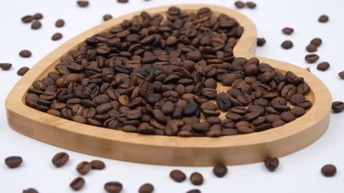 Coffee Beans in Heart-Shaped Wooden Bowl