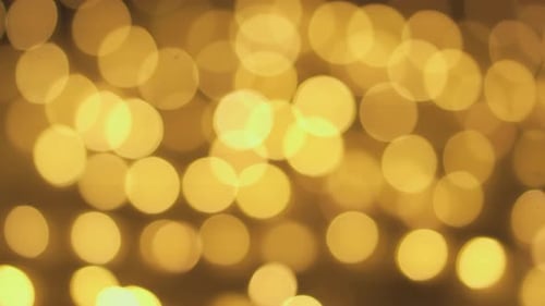 Abstract Yellow Lights with Bokeh Effect Background