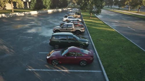 Quiet Afternoon at an Empty Parking Lot with Various Parked Vehicles