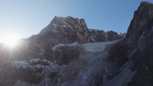 Aerial View of a Majestic Glacier Nestled in the Snowy Peaks of the Himalayas Captured During a