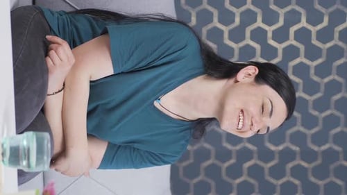Vertical video of The woman in love thinks of her lover.