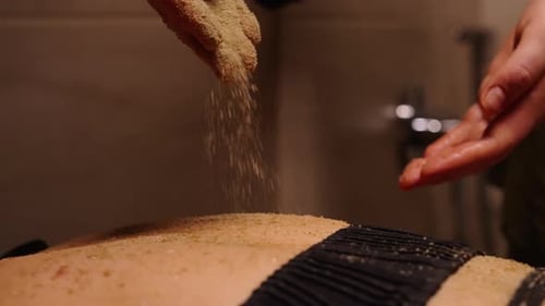 Beauty And Health Treatments In Modern SPA Closeup View Of Hand Pouring Organic Natural Scrub