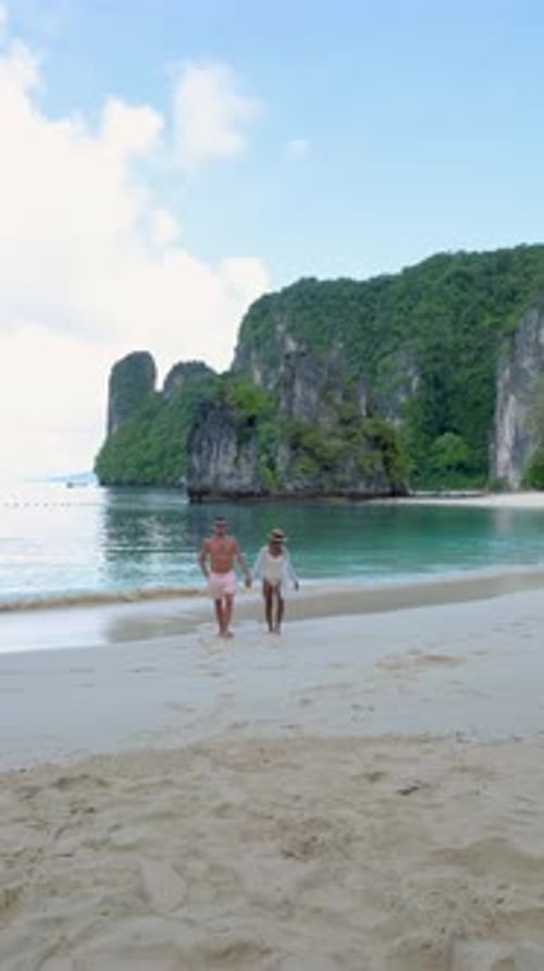 Couple Men and Women on a Tropical White Beach in Thailand Koh Hong Island Krabi