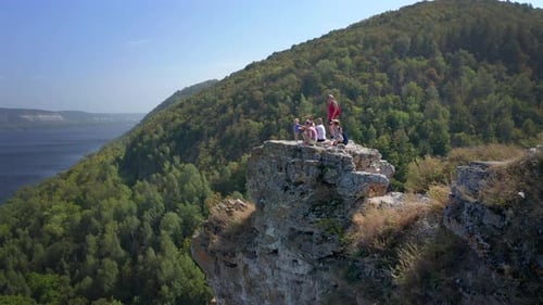 Hikers on the rock. Group of hikers stand on top of the rock ( Camel Rock) and enjoy the view. Zhigu